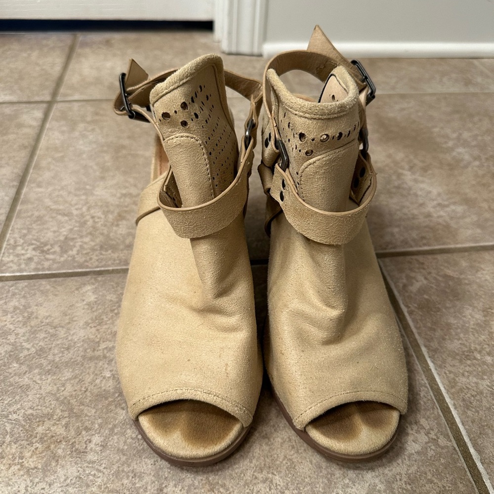 Tan size 10 booties with buckles on side
